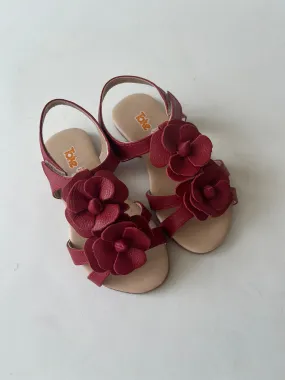 Red leather sandal with two flowers