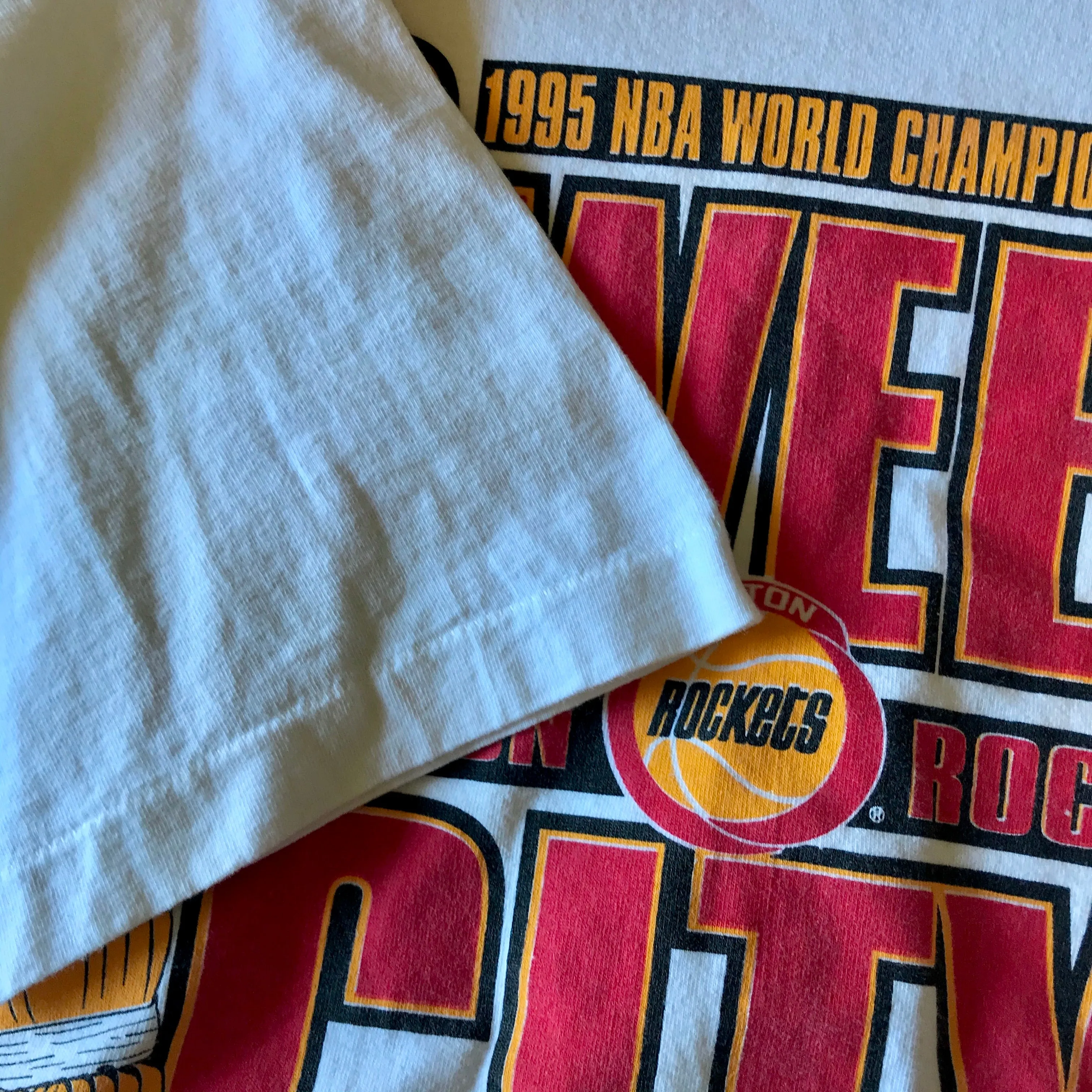 Rockets 1995 World Champions “Sweep City” Tee (White)